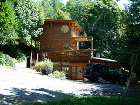 Wooden house at Whiffen Spit Beach