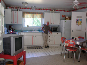 Richard having a coffee in the kitchen