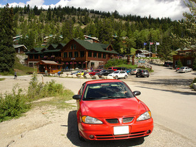 Pontiac in front of Pyramind Resort by lake