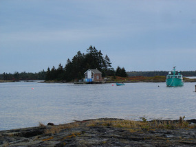 Small house on island and water