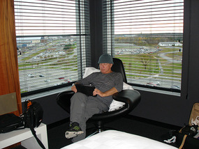Richard watching fishing program on ipad