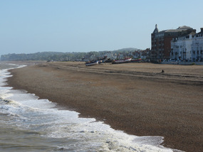 Fishing boats hauled up onto the shingle beach 