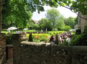 Gardens & outdoor meals area of Hangleton Manor 