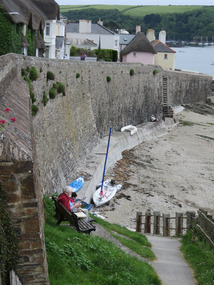 Quiet read by the seawall