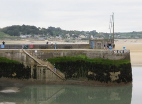 Rock in the distance on other side of estuary
