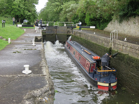 Narrowboat in lock on River Avon