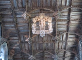 Cathedral oak beam ceiling and statue of Christ