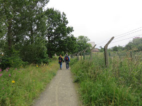 Track to the bus stop by the rugby field