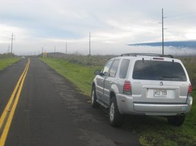 - our  four-wheel vehilcle on the way to Mauna Kea