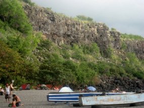 - a few people spending X-Mas day on beach