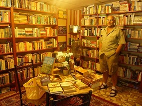 - Micheal surrounded by the books he loves