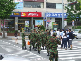 Soldiers crossing the street