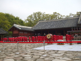 Robed People Enter and Form Lines