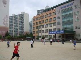Kids Running in School Playground