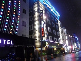 Motel Lit Up at Night