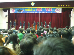 Students Leaving Stage