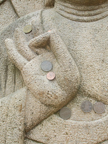 Coins Placed on Hand