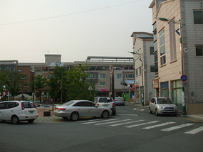 Overlooking a Small Park and All New Buildings