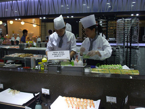 Preparing Sushi Buffet