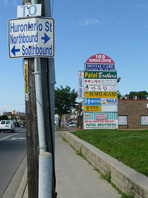 Plaza and Street Sign