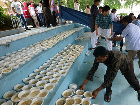 Lines of Kheer Bowls