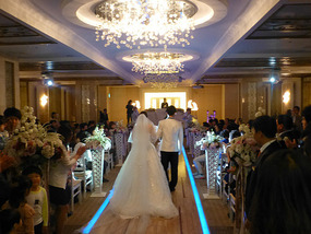 Bride and Groom Walk Down Aisle