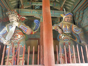 Giant Gods with Instrument and Sword