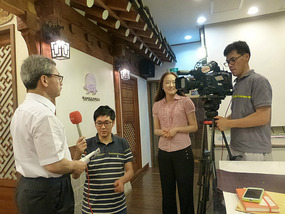 TV Crew Interviews Director