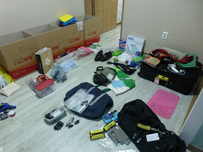 Trying to Pack Four Boxes and Suitcase