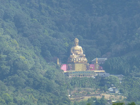 Distant Giant Gold Statue