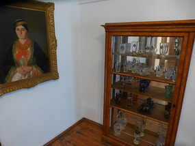 Portrait and Glass Cabinet