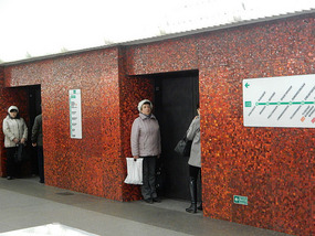 Waiting by Steel Doors