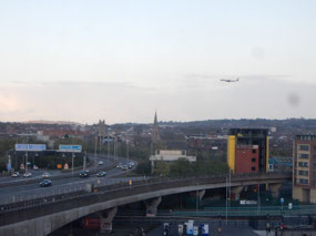 Airplane Landing over Highway