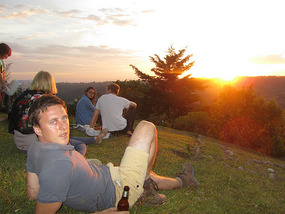 John with a beer at sunset