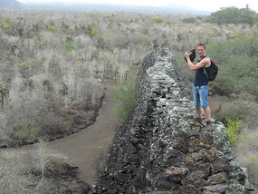 Holding a rock from wall