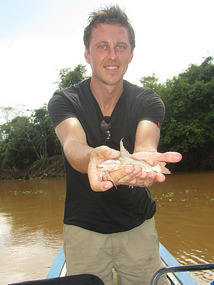 Holding his catfish