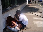 People writing on the wall outside BMI