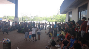 Street performers at Brazil immigration
