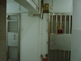 Opposite the door