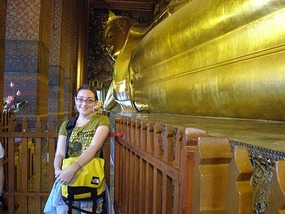 With giant Reclining Buddha