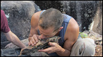 Making fire with two sticks