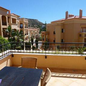 Our balcony with table and six chairs