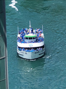 Boat headed under the falls