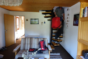 Careful manoeuvre down spiral stairs