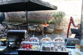 Breakfast — note the harpist on the right