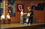 Liam accepting an award at school