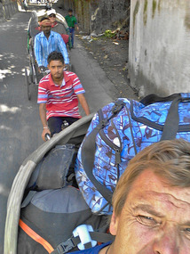 Dave and I took pedicabs 2 km to the hotel