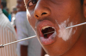 Close-up of Skewer through a cheek 