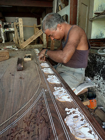 Woodworker doing inlay