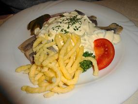 Fish with funny German pasta
